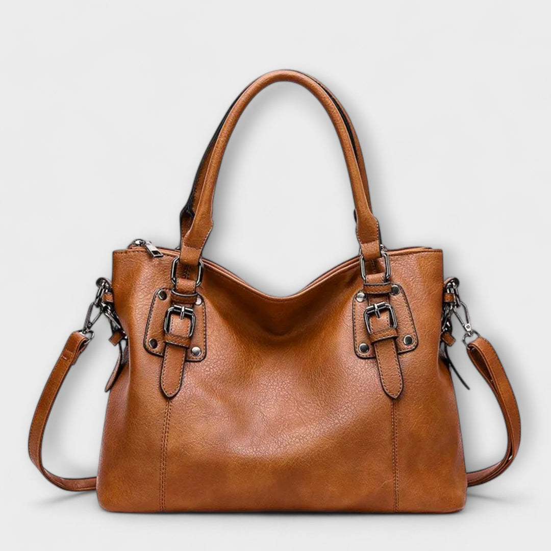 Elegant brown women's leather shoulder bag with a sleek design, perfect for daily use or luxury occasions.