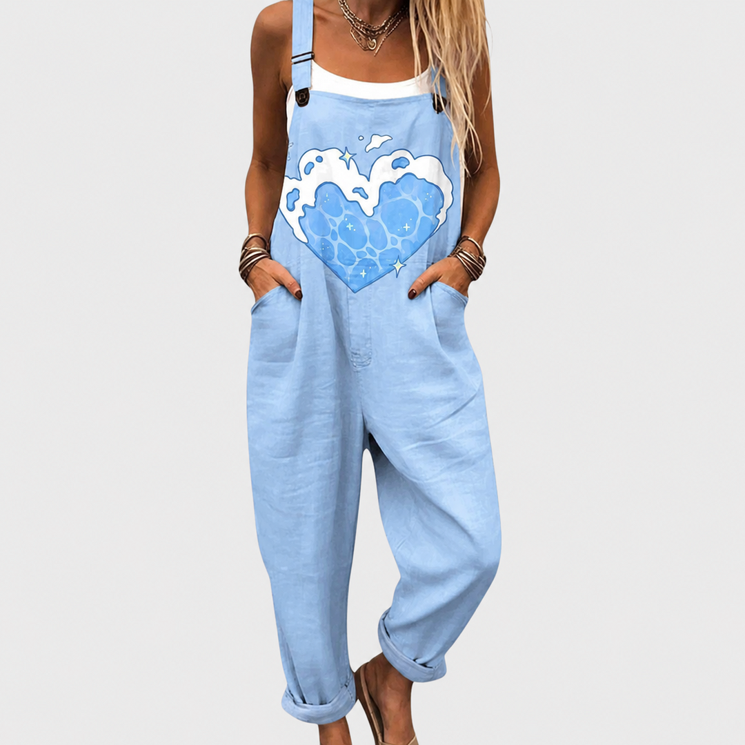 Woman wearing a comfortable floral print wide-leg jumpsuit, ideal for casual summer or travel outfits.