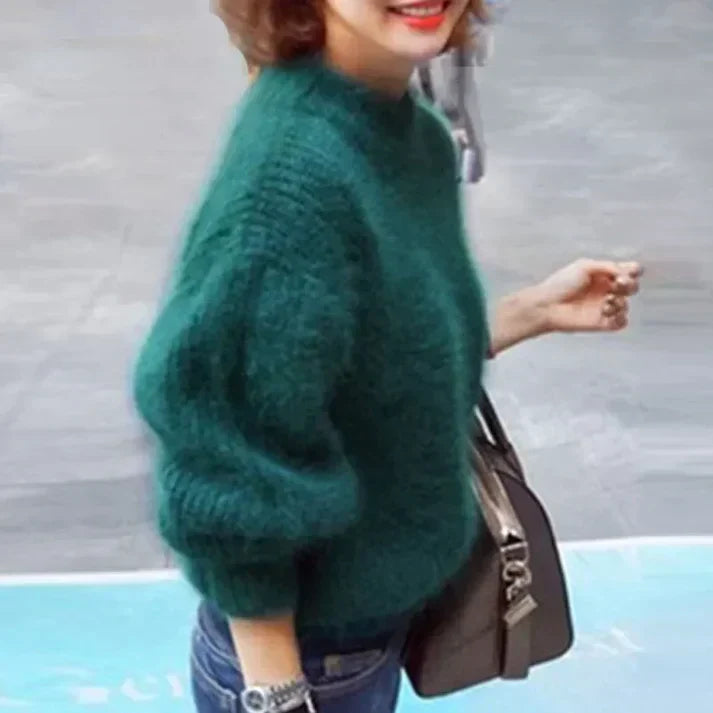 Chic women's vintage pullover sweater, ideal for cozy fall outfits or elegant winter fashion.