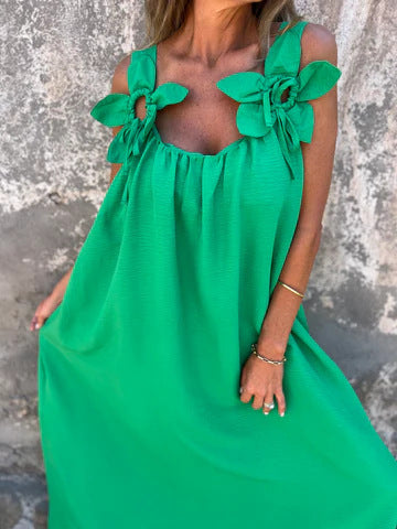 Front view of a women's elegant U-neck maxi dress with bow straps, emphasizing the flattering neckline.