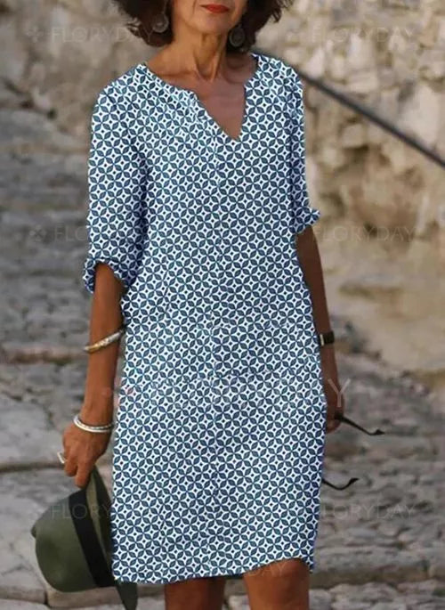 Soft, lightweight women's flowy midi dress. Casual summer day dress, perfect for relaxed vacation wear.