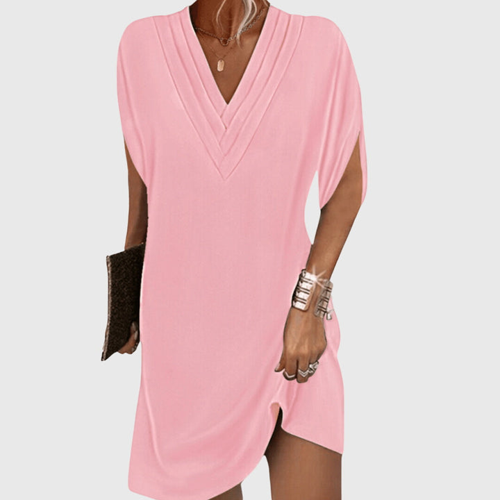 Women's flowy V-neck midi dress, designed for tummy control and a comfortable, elegant, and flattering summer look.