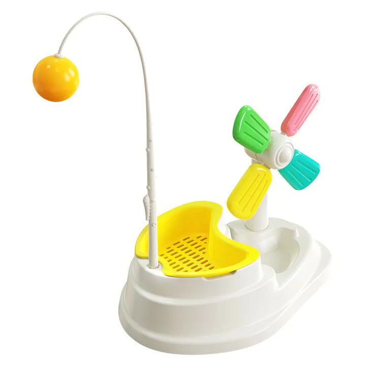 Interactive cat windmill toy featuring rotating balls & a treat slot for engaging mental stimulation & enrichment.