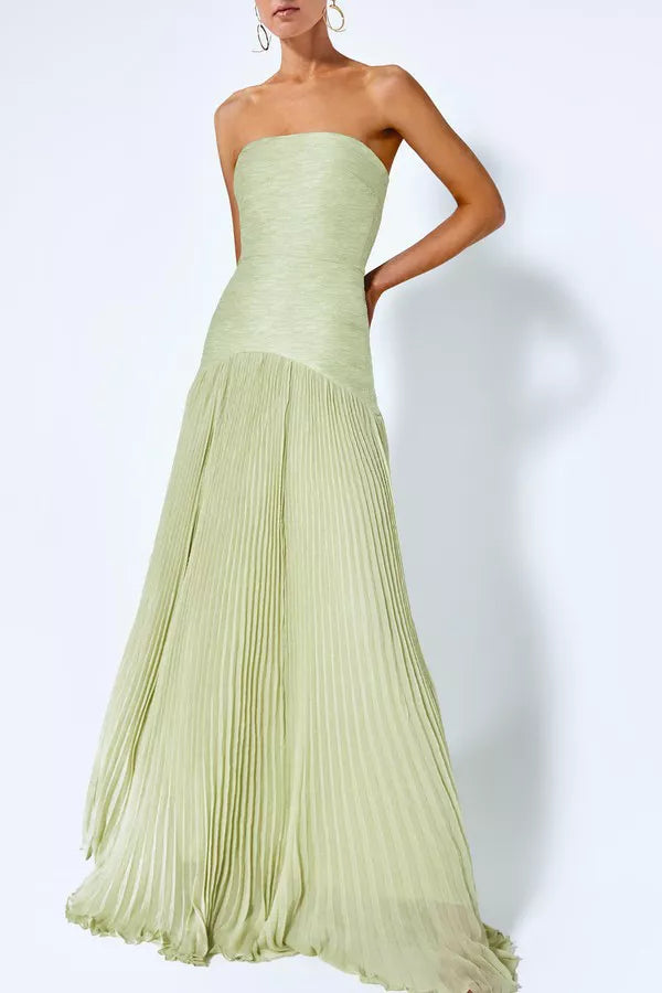 Elegant women's pistachio green sleeveless maxi dress featuring a beautiful flowing design, ideal for summer evenings.
