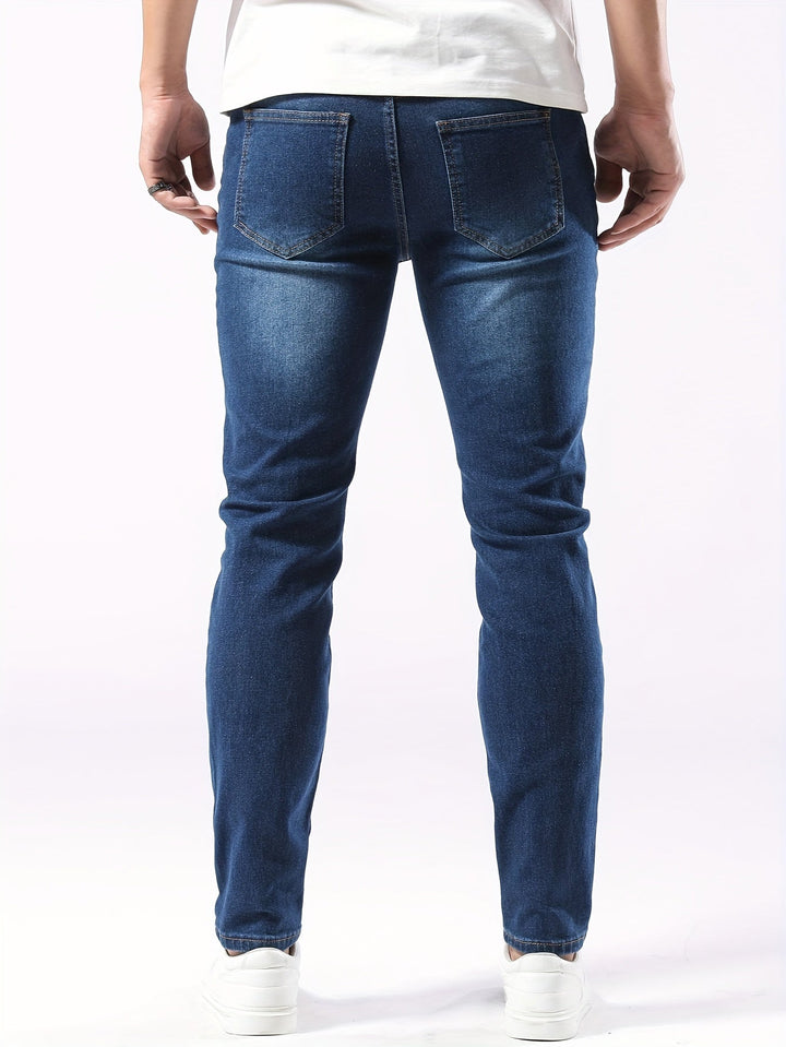 Man wearing comfortable slim fit stretch jeans, showcasing stylish and casual mens fashion.