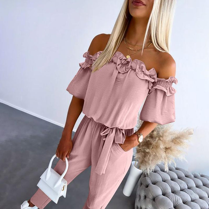 Elegant army green off-shoulder jumpsuit with tie-waist, a versatile piece for stylish casual or evening wear.