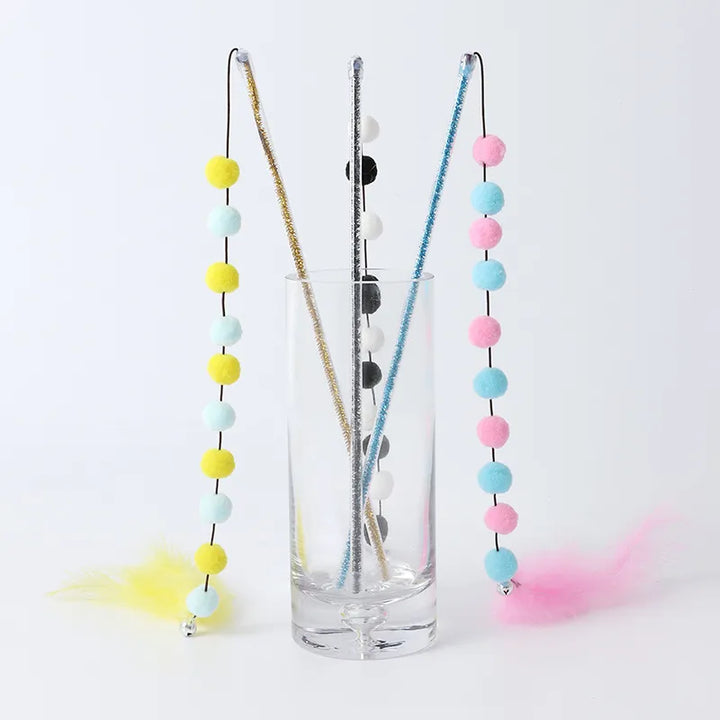 Cat interactive toy wand with various attachments for boredom relief, keeping playful felines entertained & happy.