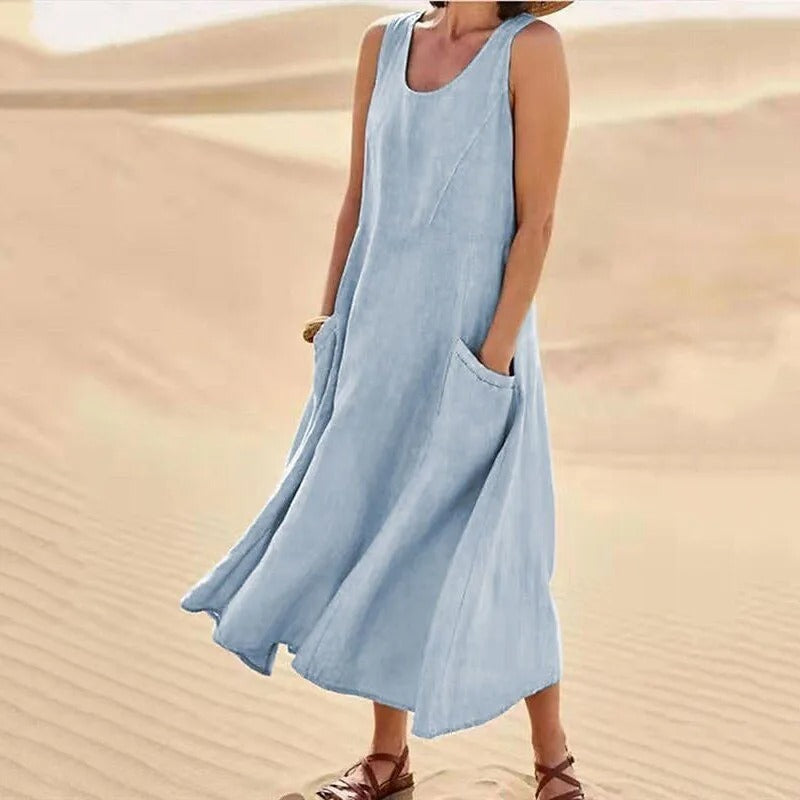 Elegant yet casual women's sleeveless dress with pockets; versatile for various occasions.