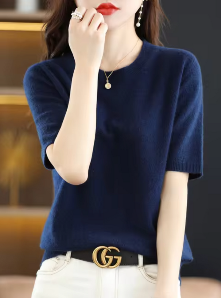 Modern classic women's short-sleeve knit top. Elegant, chic, and cozy for versatile daily wear.