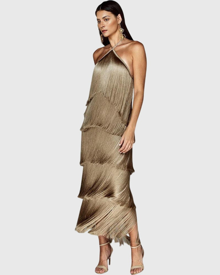 Luxurious tassels on an elegant women's halter party dress. Ideal for special occasions and evening wear.