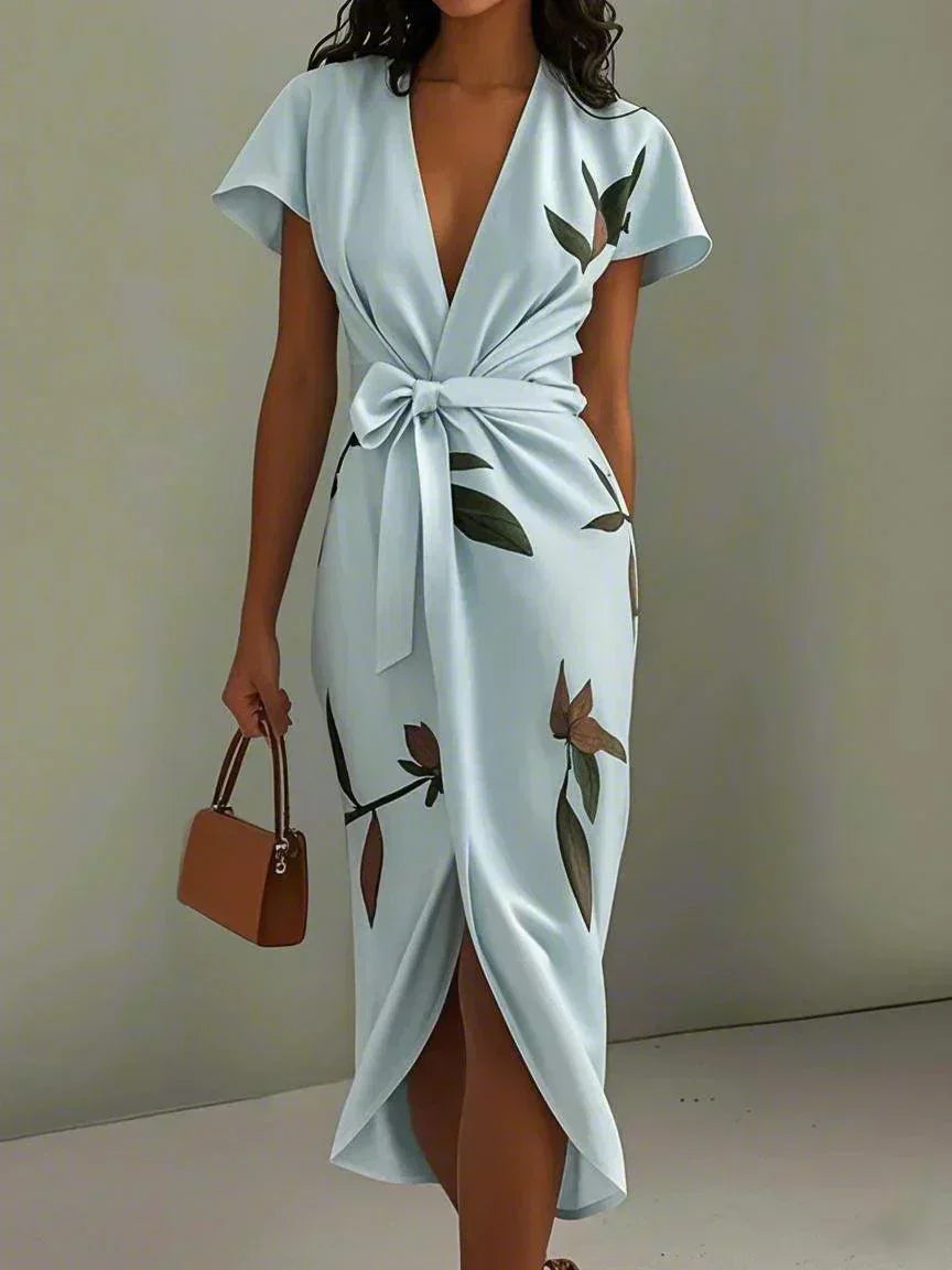 Stylish women's wrap midi dress for occasion wear. Elegant light blue or white formal dress for special events.