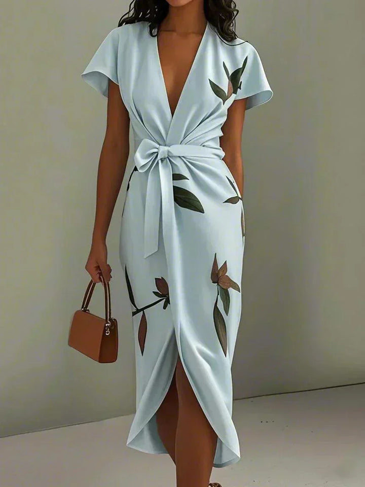 Stylish women's wrap midi dress for occasion wear. Elegant light blue or white formal dress for special events.