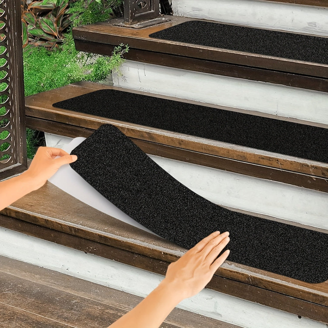 Rubber anti-slip tread strips for enhanced stair and driveway safety, providing extra grip and traction.