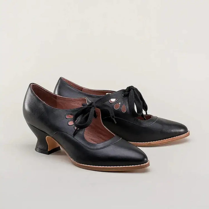 Elegant women's vintage Mary Jane block heel shoes, ideal for pin-up fashion, retro style, and formal wear.