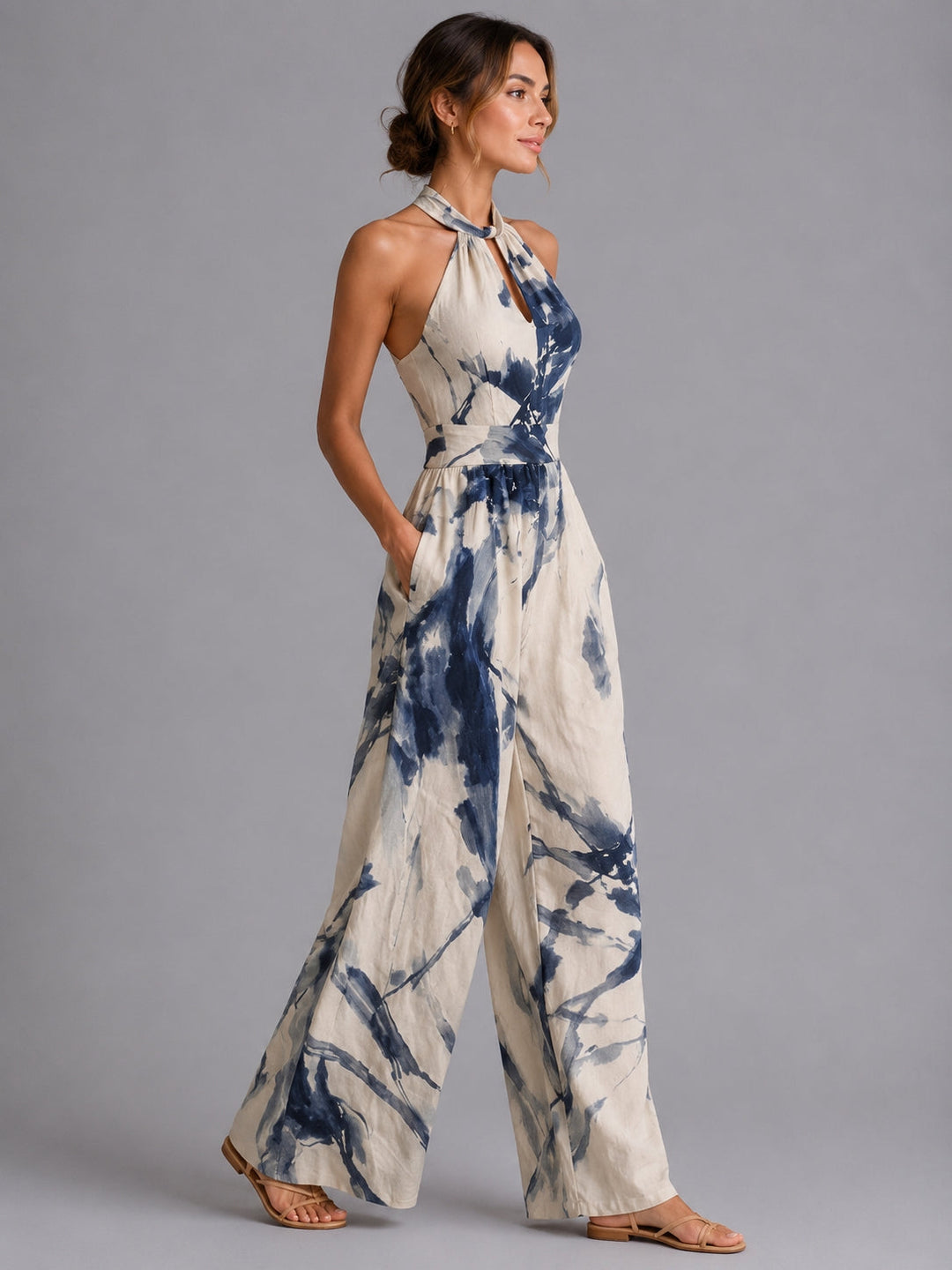 Stylish women's halter wide-leg jumpsuit, a comfortable one-piece for casual elegant spring fashion.