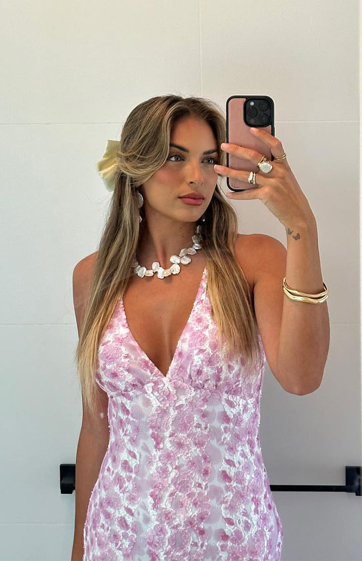 Elegant formal pink lace maxi dress for women, ideal as a wedding guest or party dress.