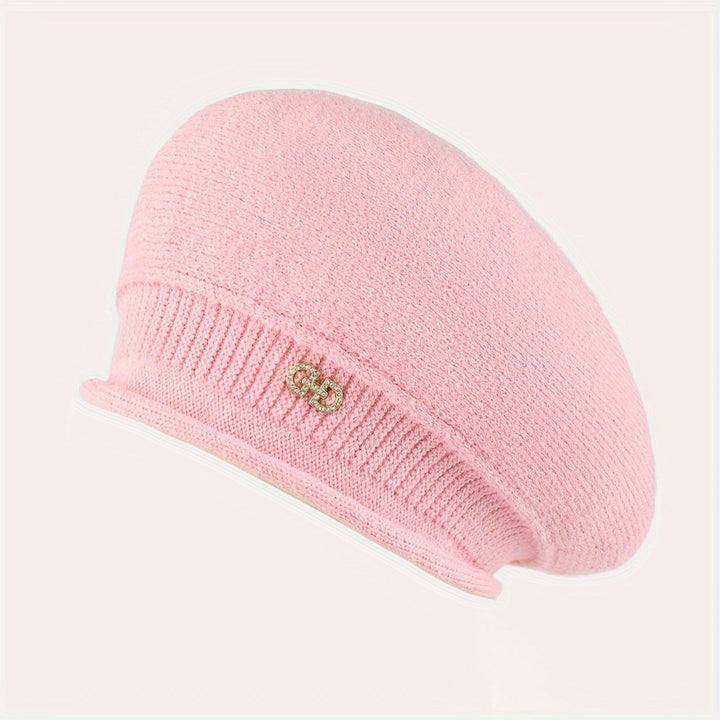 Essential winter accessory: a chic women's knitted beret for warmth and elegant fashion.