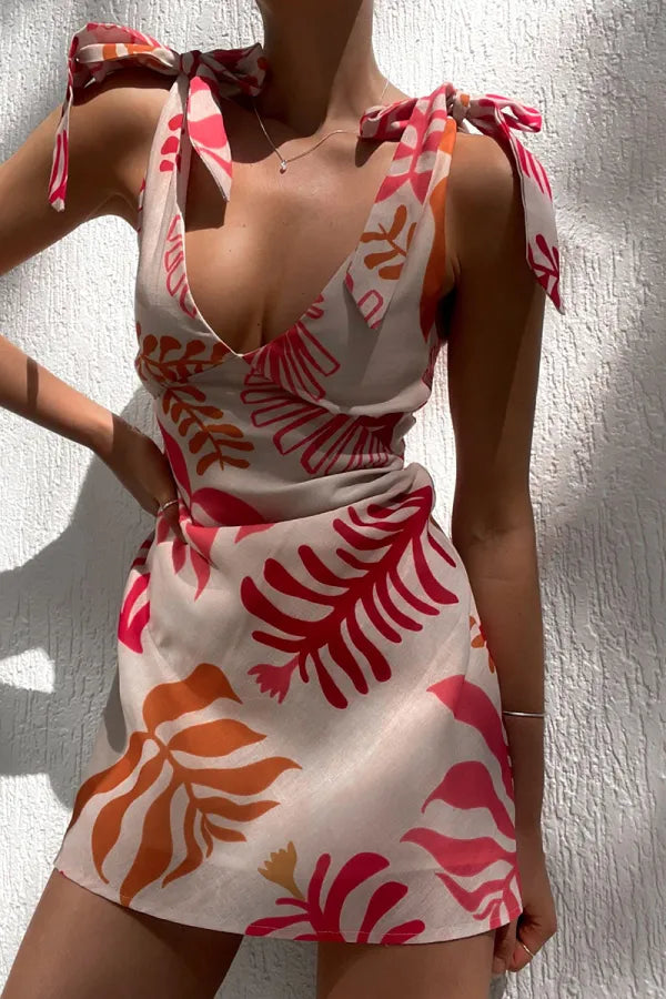Elegant women's short red summer dress. Flattering sleeveless mini for parties, holidays & casual chic.