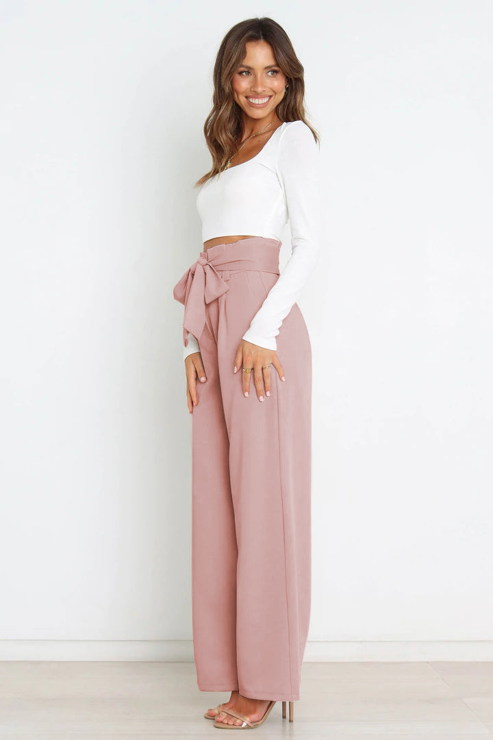 Casual chic women's paperbag trousers, high waist and a lovely bow tie for comfort.