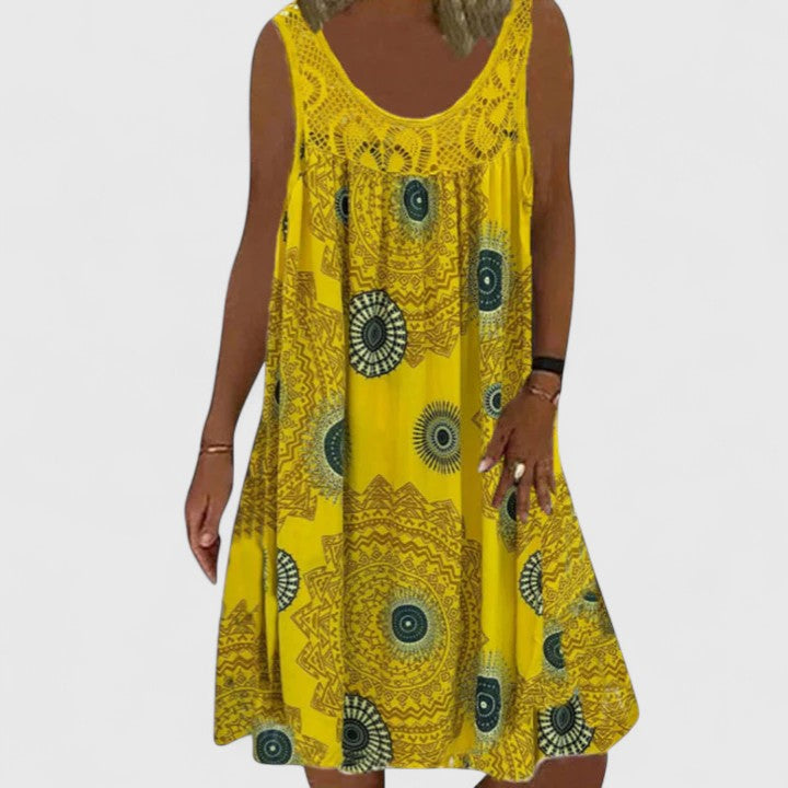 Women's comfortable boho summer dress with flattering A-line fit & ethnic mandala print, perfect for vacation.