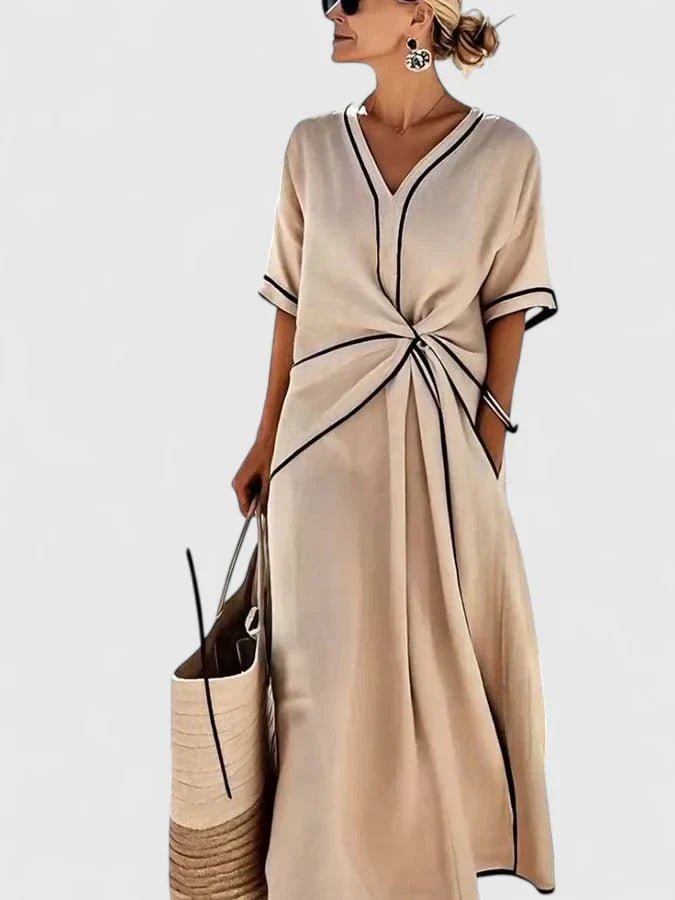 Versatile women's elegant striped summer dress. Comfortable flowy maxi ideal for casual and everyday wear.