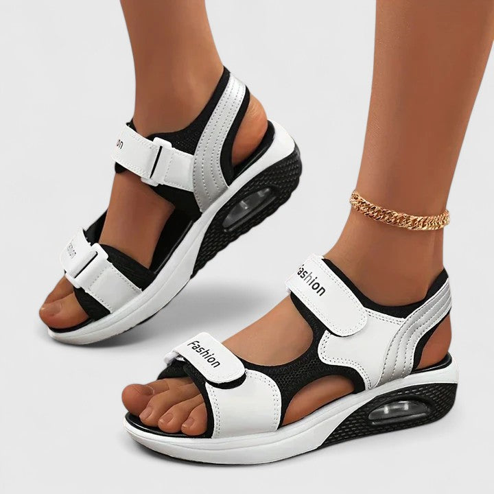 Cushioned women's walking sandals with arch support, non-slip sole, perfect for summer comfort & foot health.