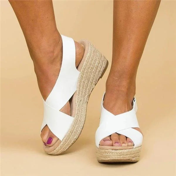 Lightweight slip-on wedge sandals for women. Ideal comfortable footwear for summer vacations.