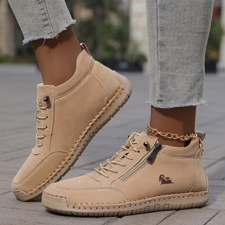 Women's high-top lace-up sneakers with side zip, ensuring a comfy and secure fit.
