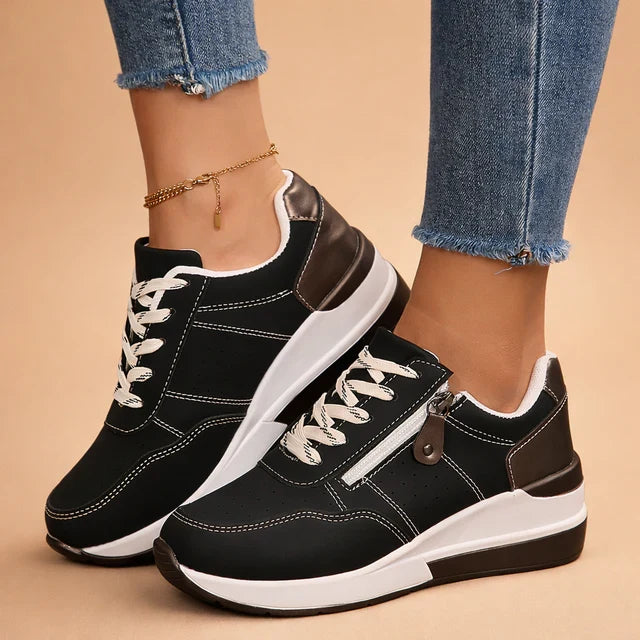 Perforated women's low-top sneakers, comfortable and stylish, ideal for spring & summer.