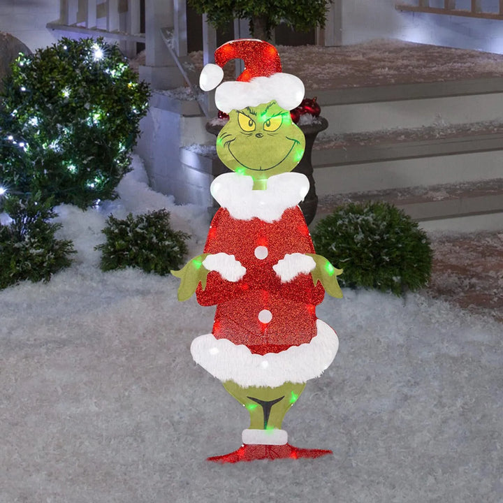 Grinch-themed Christmas decoration with festive LED lighting for outdoor garden joy.