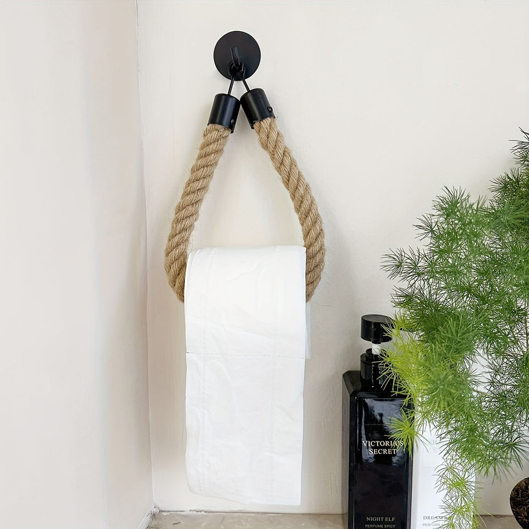 Stylish hemp rope toilet paper holder. Rustic, wall mounted, natural material bathroom decor.