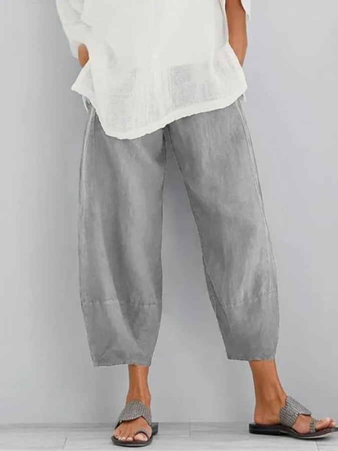 Casual women's khaki cropped trousers. Relaxed fit pants with pockets & elasticated waist, perfect for everyday.