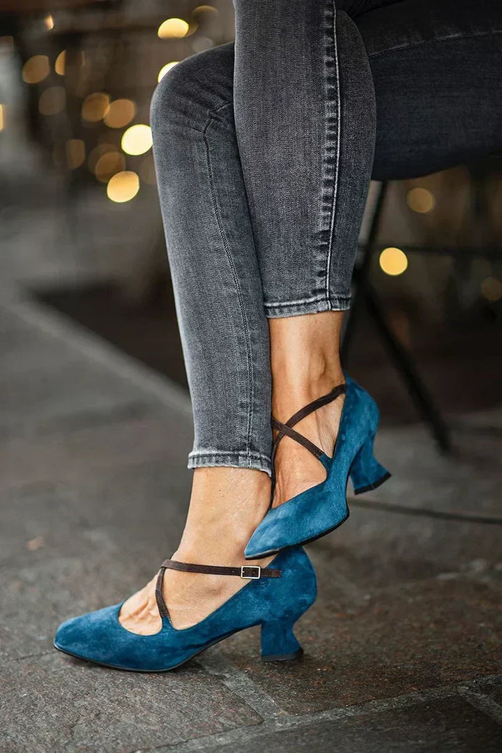 Chic women's blue strappy mid-height block heels with a square toe, ideal for elegant formal or party attire.
