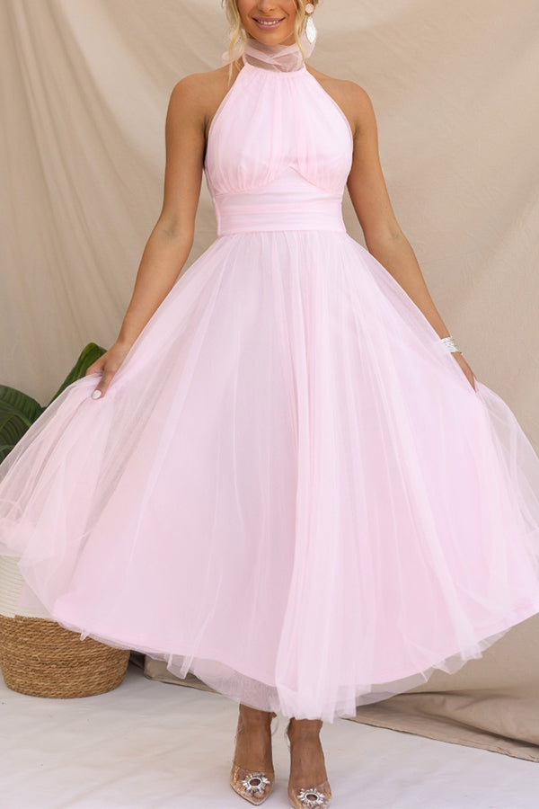 Sleeveless elegant midi dress, offering a chic look for formal events.