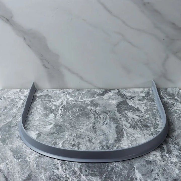 "Flexible waterproof silicone shower seal for leak prevention, shown in sleek design, ideal for bathroom water barrier."