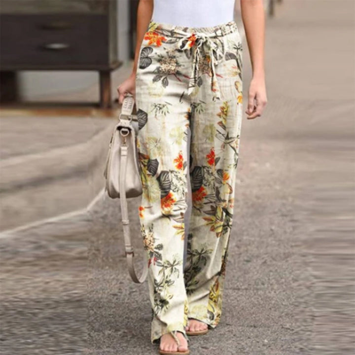 Women's mid-waist casual trousers, comfortable relaxed fit for everyday wear and style.