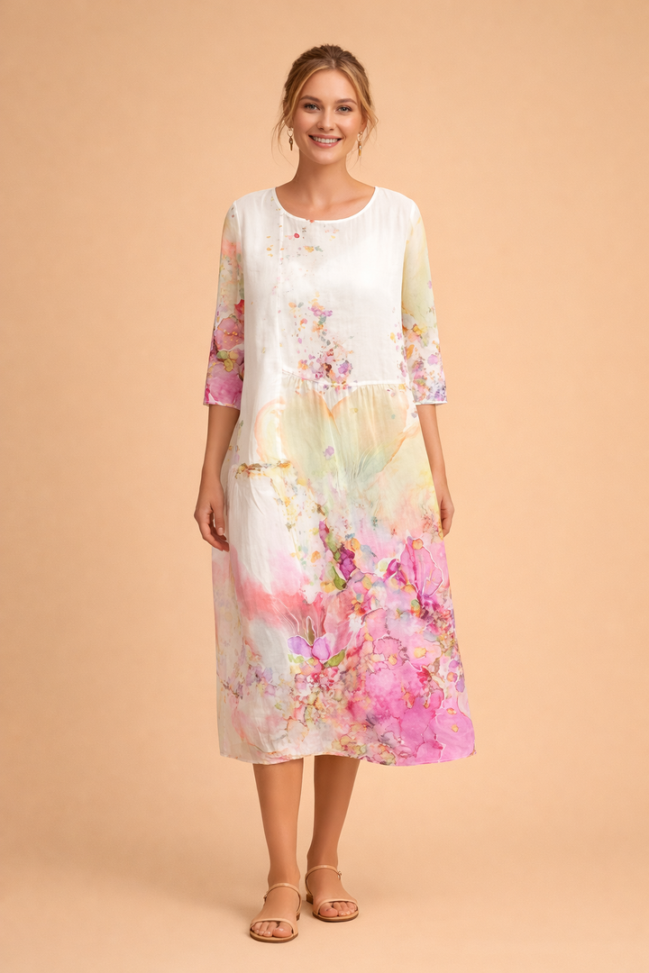 Comfortable women's floral midi dress, elegant design, airy relaxed fit, summer style.