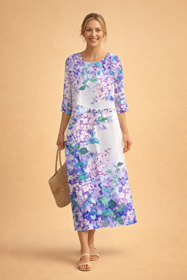 Floral print women's midi dress, elegant spring/summer fashion, comfortable relaxed fit.