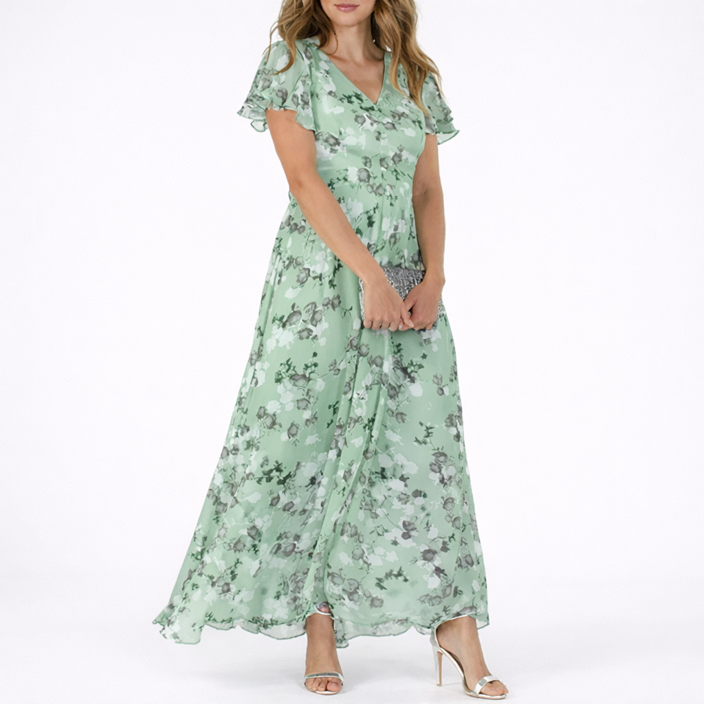 Feminine women's floral maxi dress. Comfortable, flowy design for elegant summer style, casual wear, or vacation.