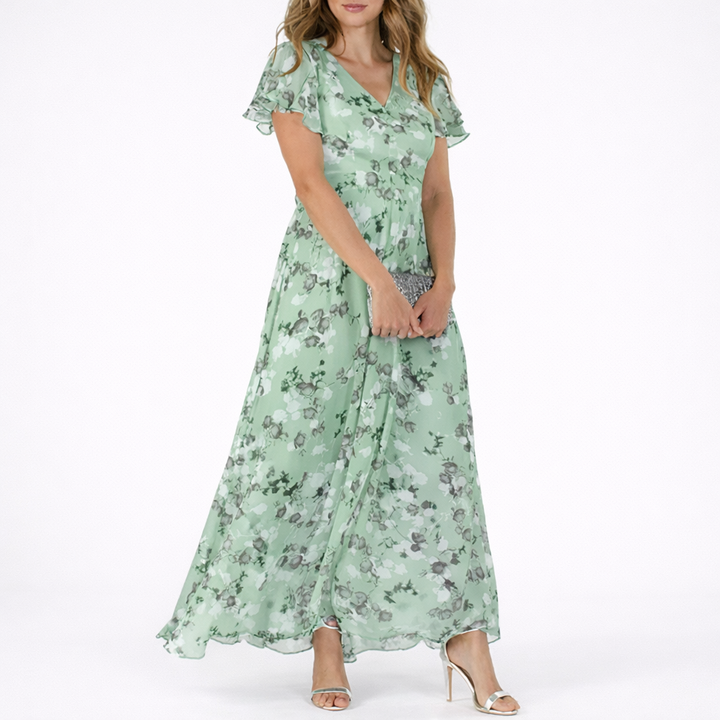 Feminine women's floral maxi dress. Comfortable, flowy design for elegant summer style, casual wear, or vacation.