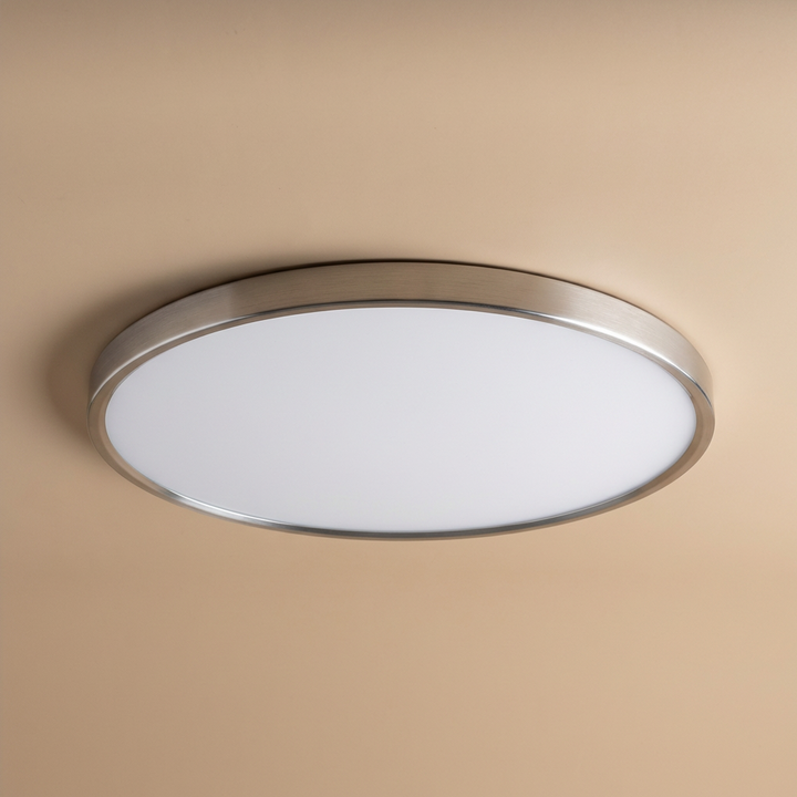 Flush mount round LED ceiling light, gold trim, perfect for modern living rooms.