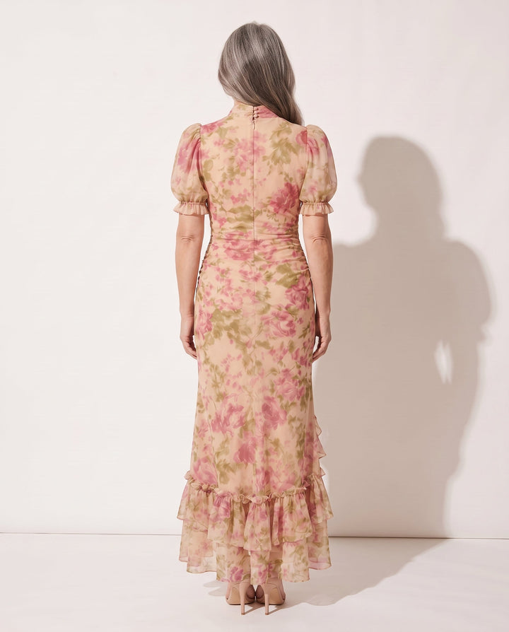 Vibrant floral print women's maxi dress with puff sleeves & ruffle details. Elegant pink & lilac occasion dress.