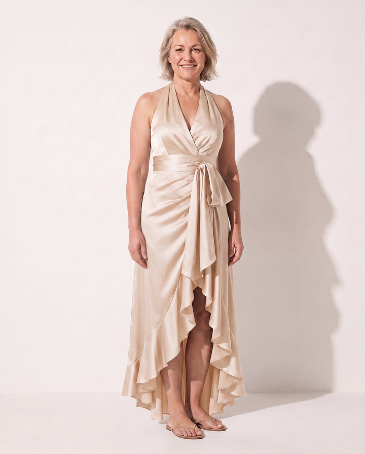 Elegant women's halter neck formal dress with a charming ruffle hem. A stunning choice for any event.