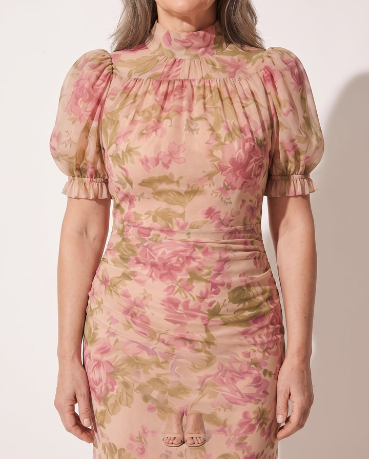 High-neck floral print maxi dress for women, featuring puff sleeves and elegant ruffles. Pink & lilac tones.