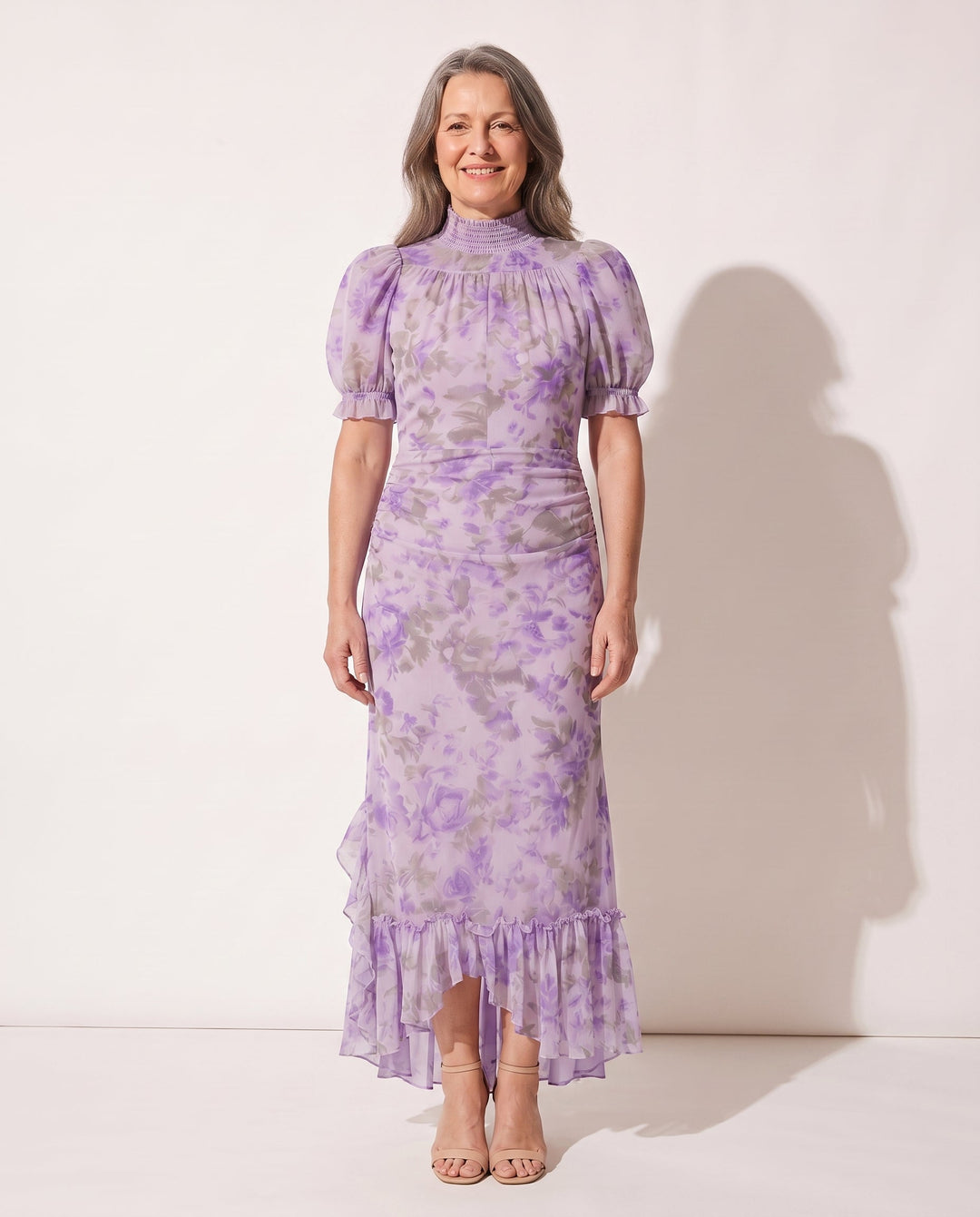Women's pink/lilac floral print puff sleeve ruffle maxi dress. Elegant summer and occasion wear.