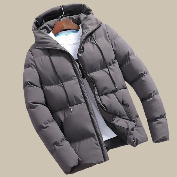 Stylish men's blue hooded puffer jacket, perfect casual winter outerwear with full zip-up design.