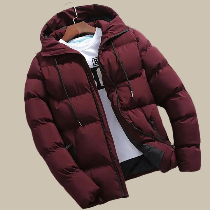 Men's durable hooded puffer jacket, available in black or red, designed for winter warmth & style.