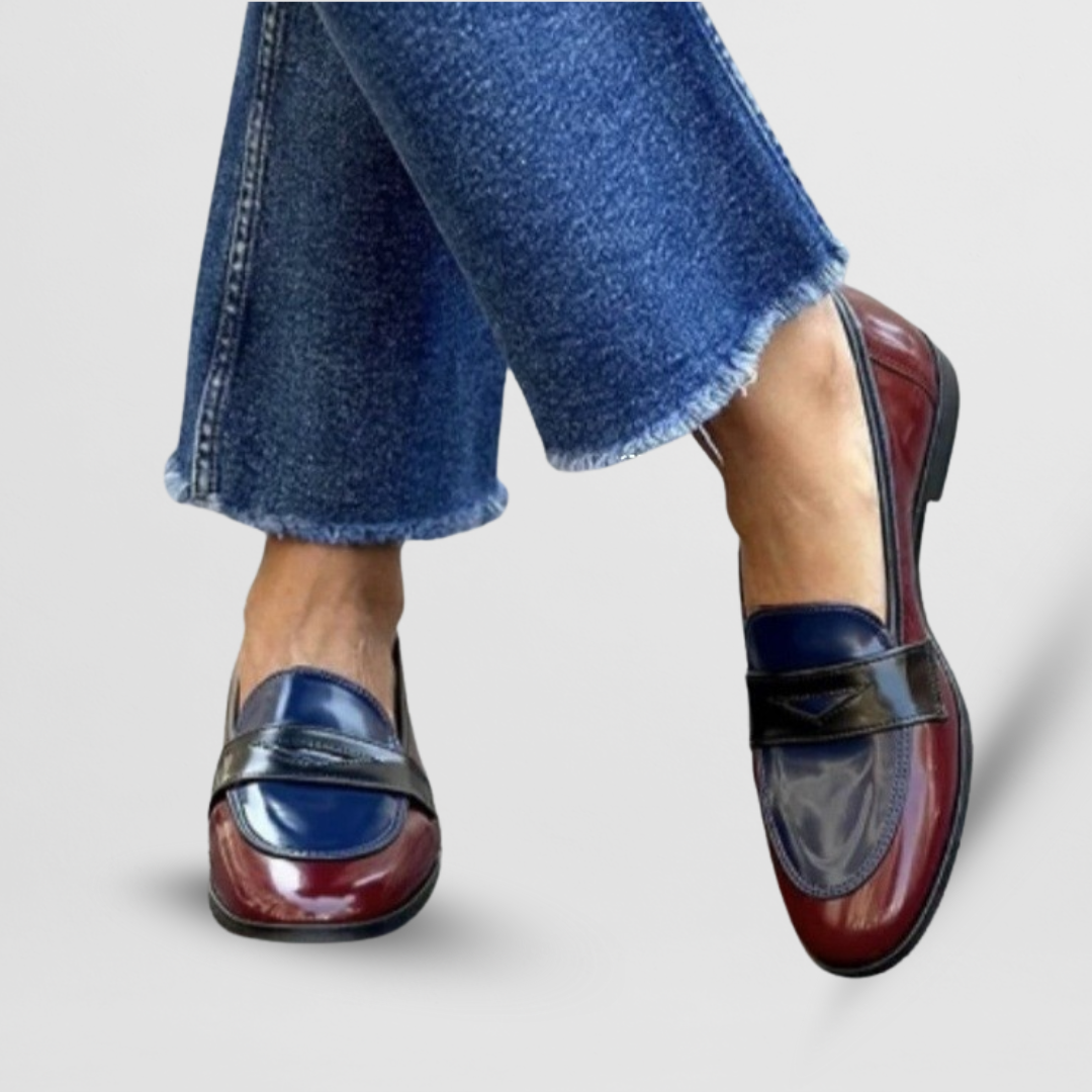 Stylish women's two-tone slip-on loafers, offering effortless comfort and versatile fashion footwear.