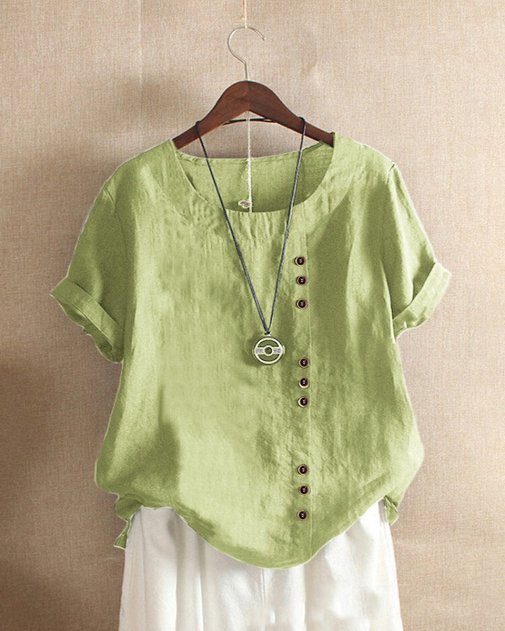 Women's short sleeve, round neck blouse, a comfortable, versatile, and elegant casual top.