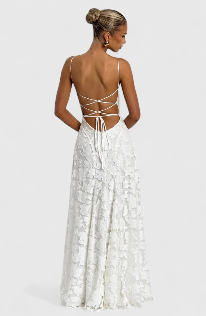 Chic cowl neck flowy maxi dress for women, featuring an elegant open back & lace-up detail.